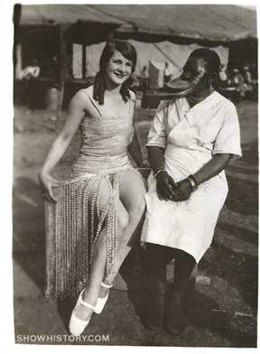 Ubangi woman with show girl on Ringling Bros. Barnum & Bailey Circus 1931.